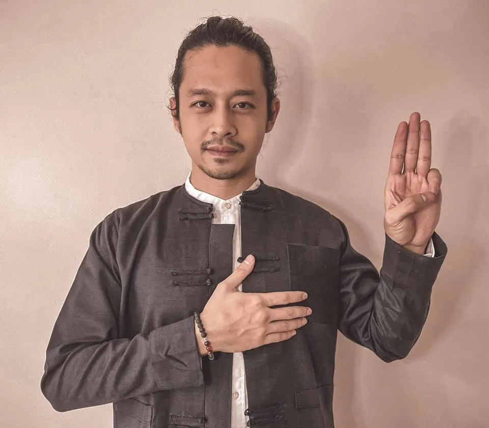 Daung (artistic name) is a former footballer and a successful, famous, and nationally acclaimed Academy Award-winning actor. His real name is Thura Aung and he was born on March 30, 1990, in Minhla Township, Thayarwady District, Bago Region.
After the coup, Daung actively campaigned for the Civil Disobedience Movement (CDM), which opposes the military regime. In response to his activism, the military-controlled Myanmar Radio and Television (MRTV) announced that he had been stripped of his Myanmar citizenship.As a stateless person, Daung sought refuge in neighboring Thailand and is actively involved in the ongoing Spring Revolution, using his artistic skills to raise funds for the cause.