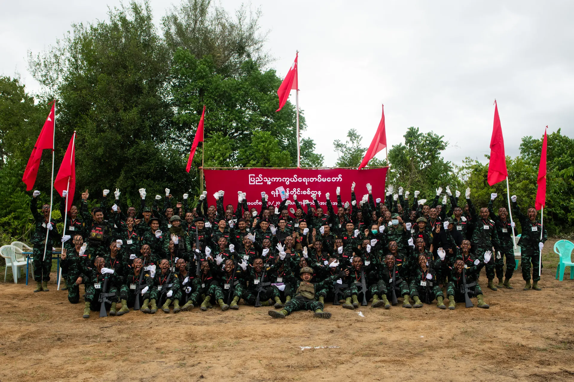 Recently recruited members of the Yangon Region People's Defence Force parade in K ayin State's Kawkareik Township on May 27, 2024.photo MarNaw