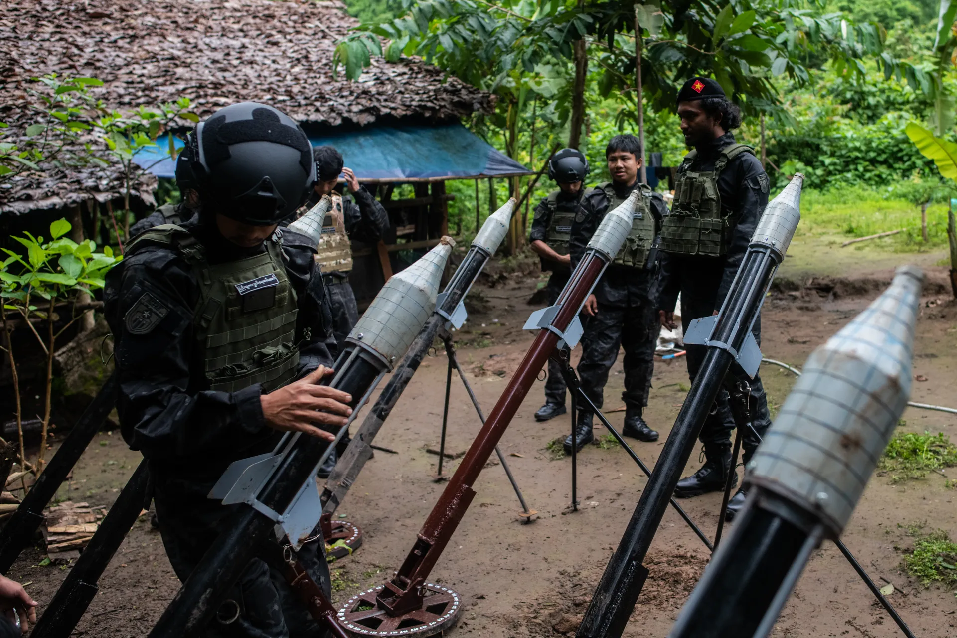 PDF soldiers prepare their homemade rocket launchers for firing. The weapons are being showed off and prepared before going to the front lines, as these rocket launchers play a key role in the fighting. This photo was taken in the KNU Brigade 7-controlled area in Hlaingbwe township on September 5, 2024. Photo – Mar Naw