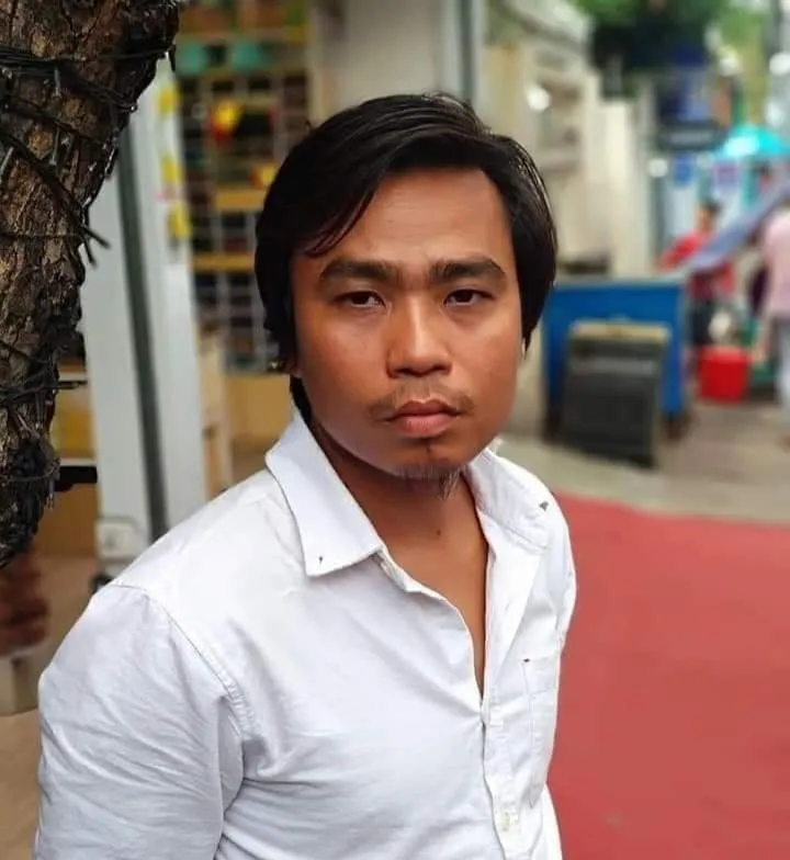 K Za Win (Chan Thar Swe) was born in 1982 in Lapdaung, a village in the Sagaing Region, to a family of farmers. At the age of 16, he published his first poem in a school magazine. K Za Win became an active participant in educational reform and land rights advocacy. In 2014, he took part in student-led protests opposing the National Education Law, aiming to reform Myanmar's education system. On March 10, 2015, he was sentenced to over a year of imprisonment in Thayarwaddy Prison. He was also a member of the Monya Poets Association.
After the 2021 coup in Myanmar, he participated in anti-coup protests in Monya.On March 3, during a protest near the Pagoda Ni Shrine on Union Road in Monya, the military opened fire on the crowd, and he was fatally shot in the head, dying from the injury."