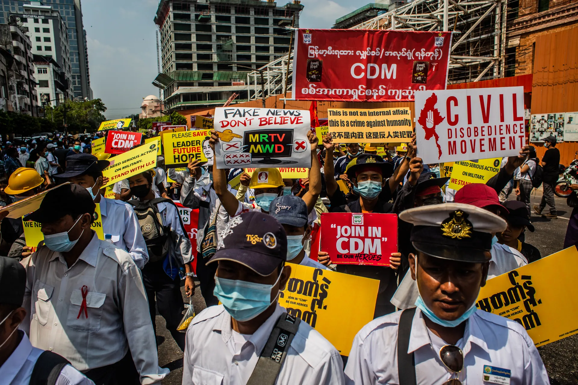People rally in a protest against the military coup and to demand the release of elected leader Aung San Suu Kyi , in Yangon ,Myanmar,February 20,2021.Photo MarNaw